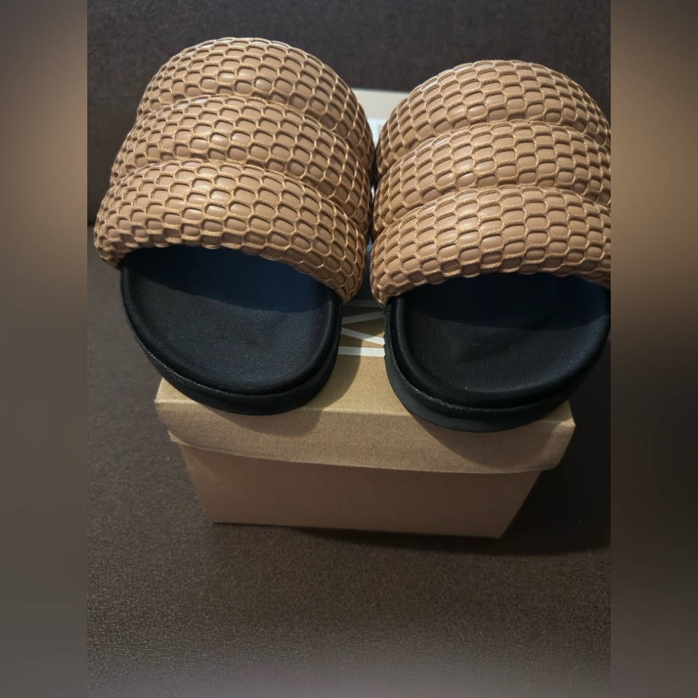BRAND NEW WITH TAGS ROAM MESH SLIDES. NUDE COLOR, SIZE 12.